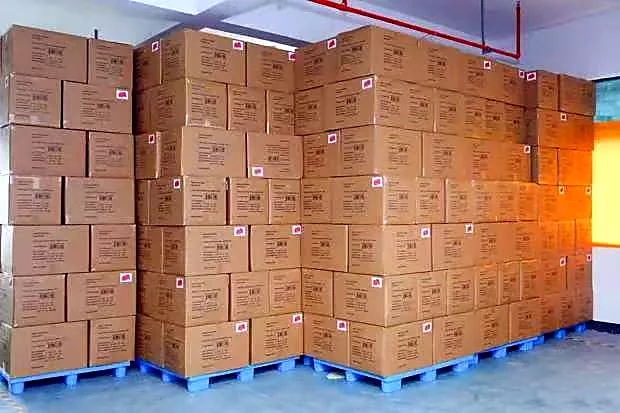 Packed pet product cartons prepared in the factory warehouse